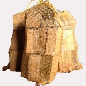 Netted bags of softwood by Kildare Logs.