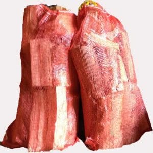 Netted bags of hardwood by Kildare logs.