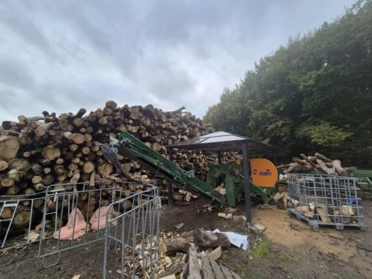 Firewood processor, timber and cages at the Calverstown yard